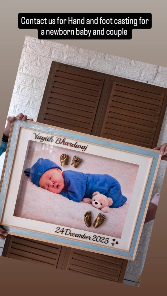 Premium wooden blue frame with full background picture and hands and feet are painted with teak color and name and dob 3D cutouts are there to enhance the beauty