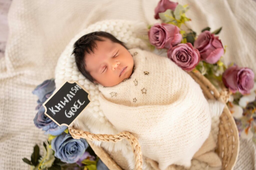 Professional newborn photography showcasing safe posing techniques by Forever with Camotions.