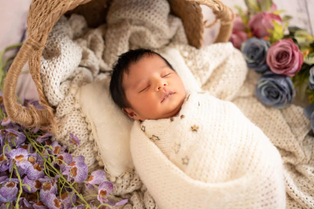 Professional newborn photography showcasing safe posing techniques by Forever with Camotions.