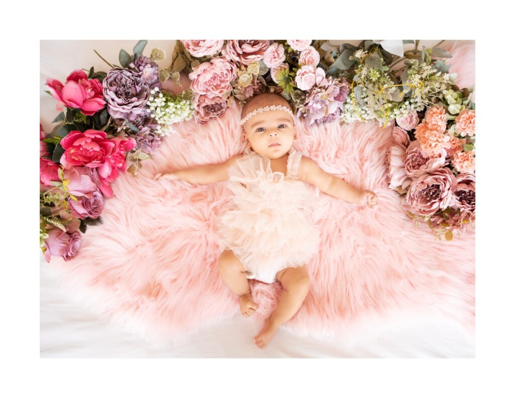 Professional newborn photography showcasing safe posing techniques by Forever with Camotions.