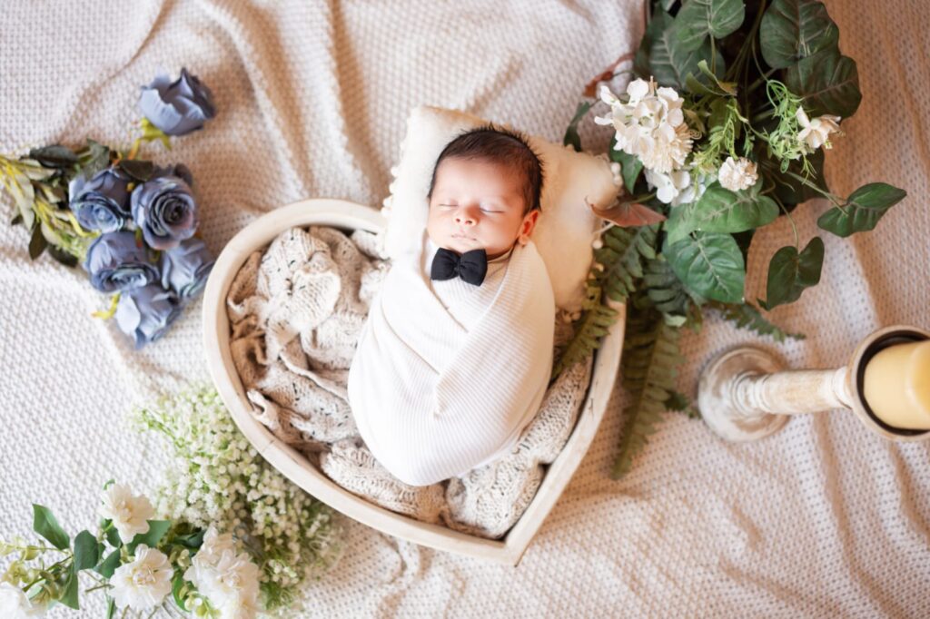 Professional newborn photography showcasing safe posing techniques by Forever with Camotions.