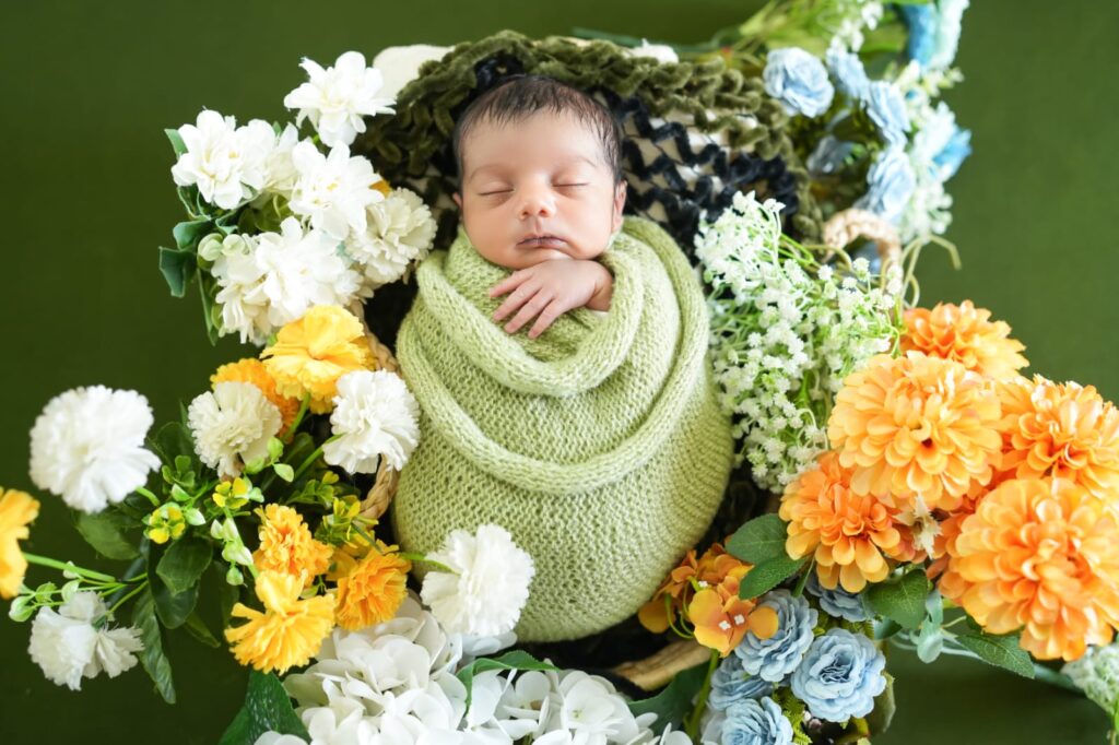 Professional newborn photography showcasing safe posing techniques by Forever with Camotions.