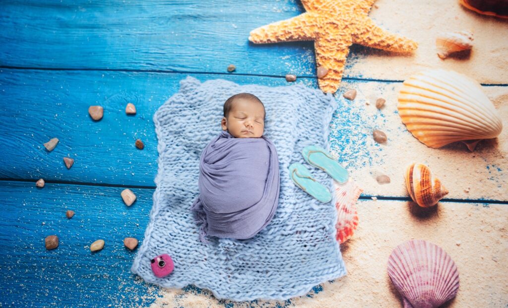 Professional newborn photography showcasing safe posing techniques by Forever with Camotions.