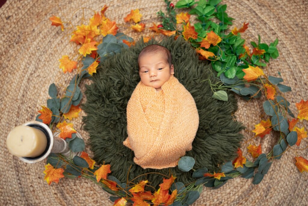 Professional newborn photography showcasing safe posing techniques by Forever with Camotions.