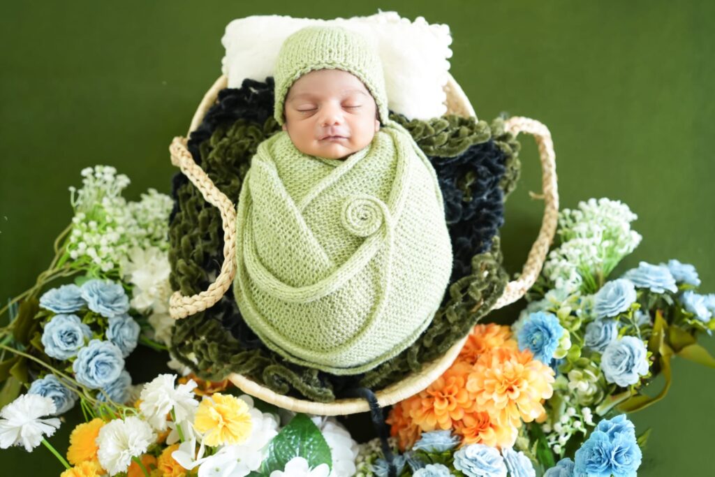 Professional newborn photography showcasing safe posing techniques by Forever with Camotions.