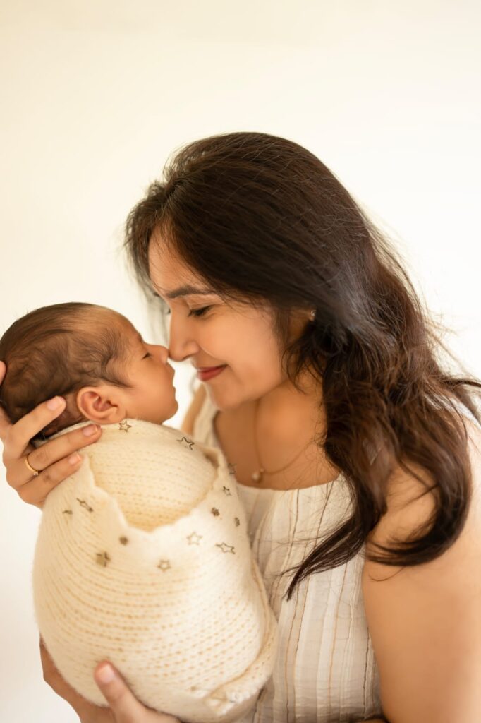 Professional newborn photography showcasing safe posing techniques by Forever with Camotions.
