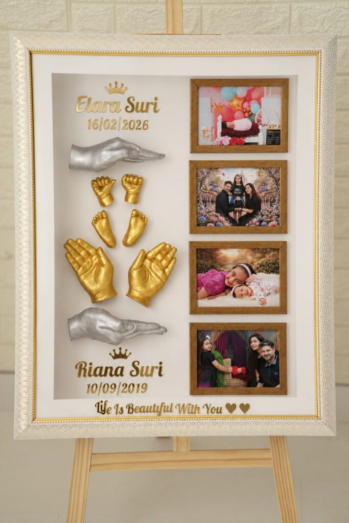 Family hand casting frame including sibling and parent hands
