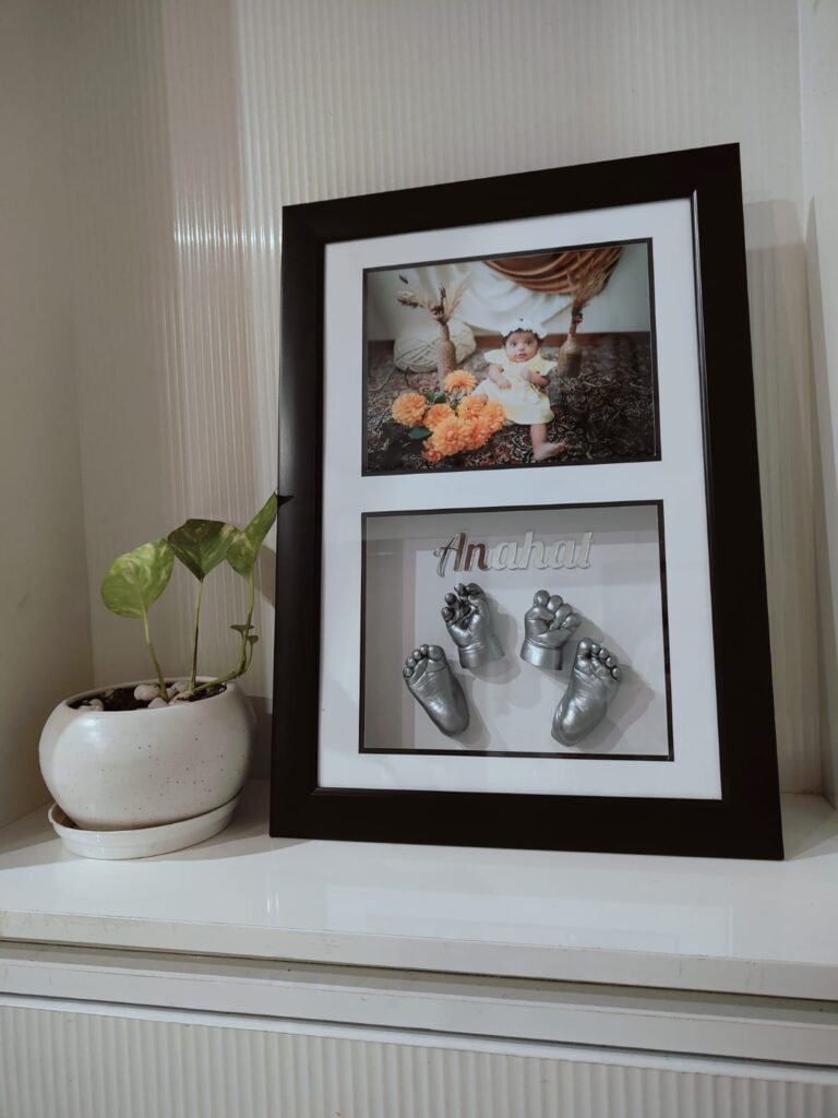 Frame of size 12*18 with castings of both hands and feet