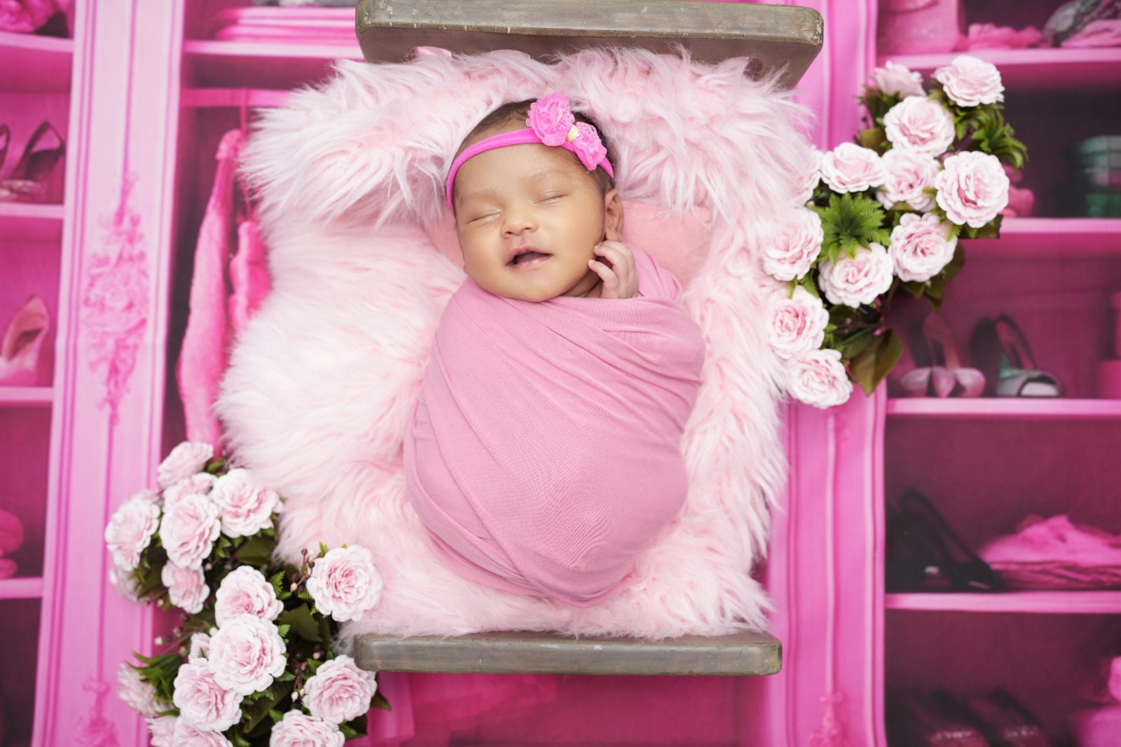 Bay posing as barbie in pink wrap